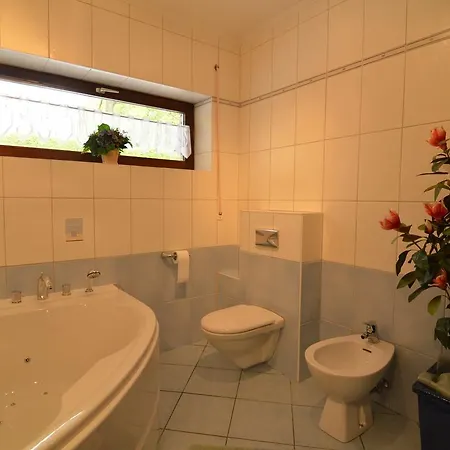 Holiday home Modish In With Sauna Waimes