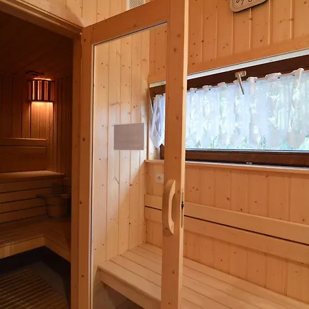 Holiday home Modish In With Sauna